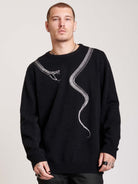 sweater with skeleton snake detail around neck.