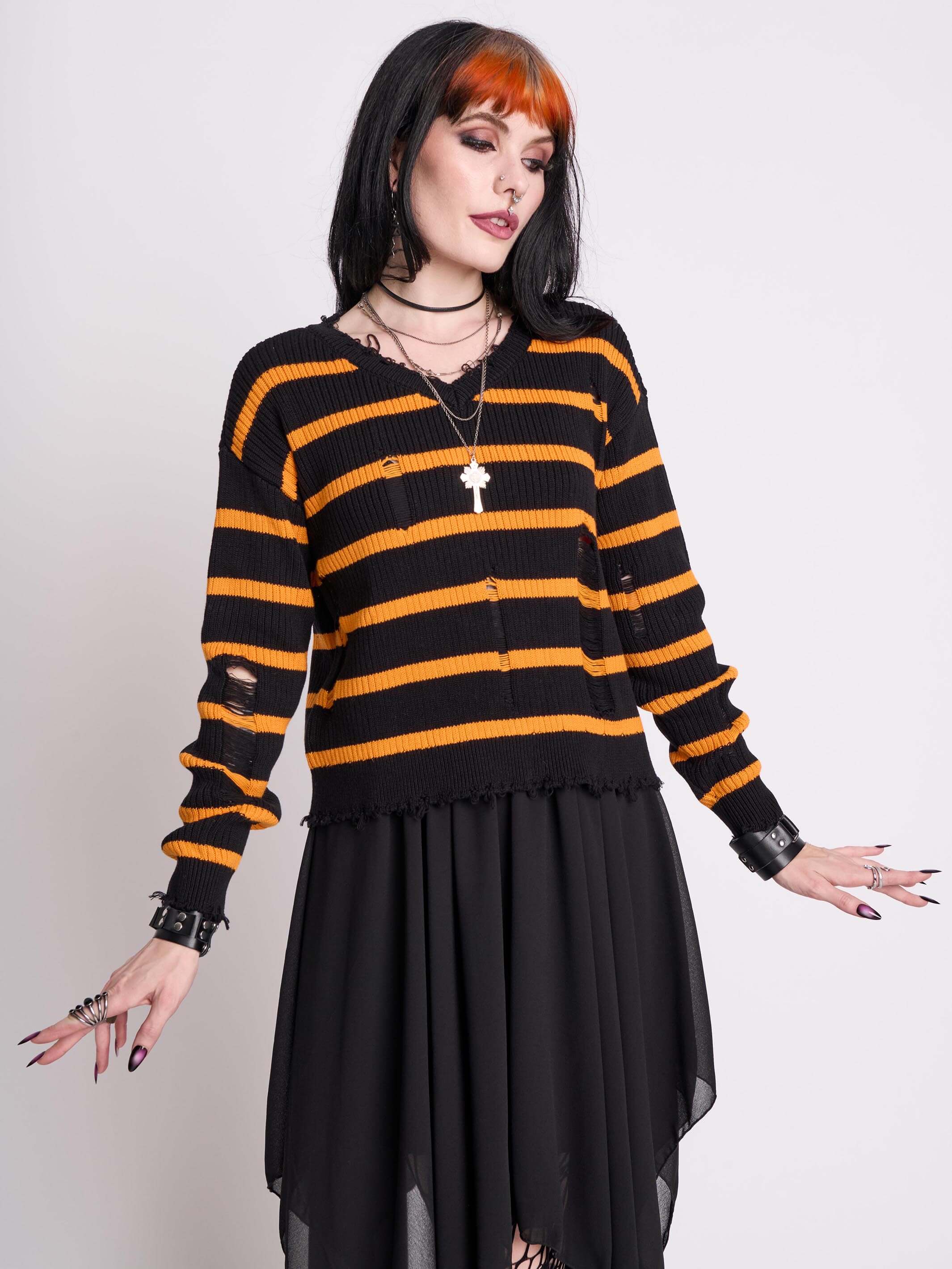 orange and black stripe distressed sweater