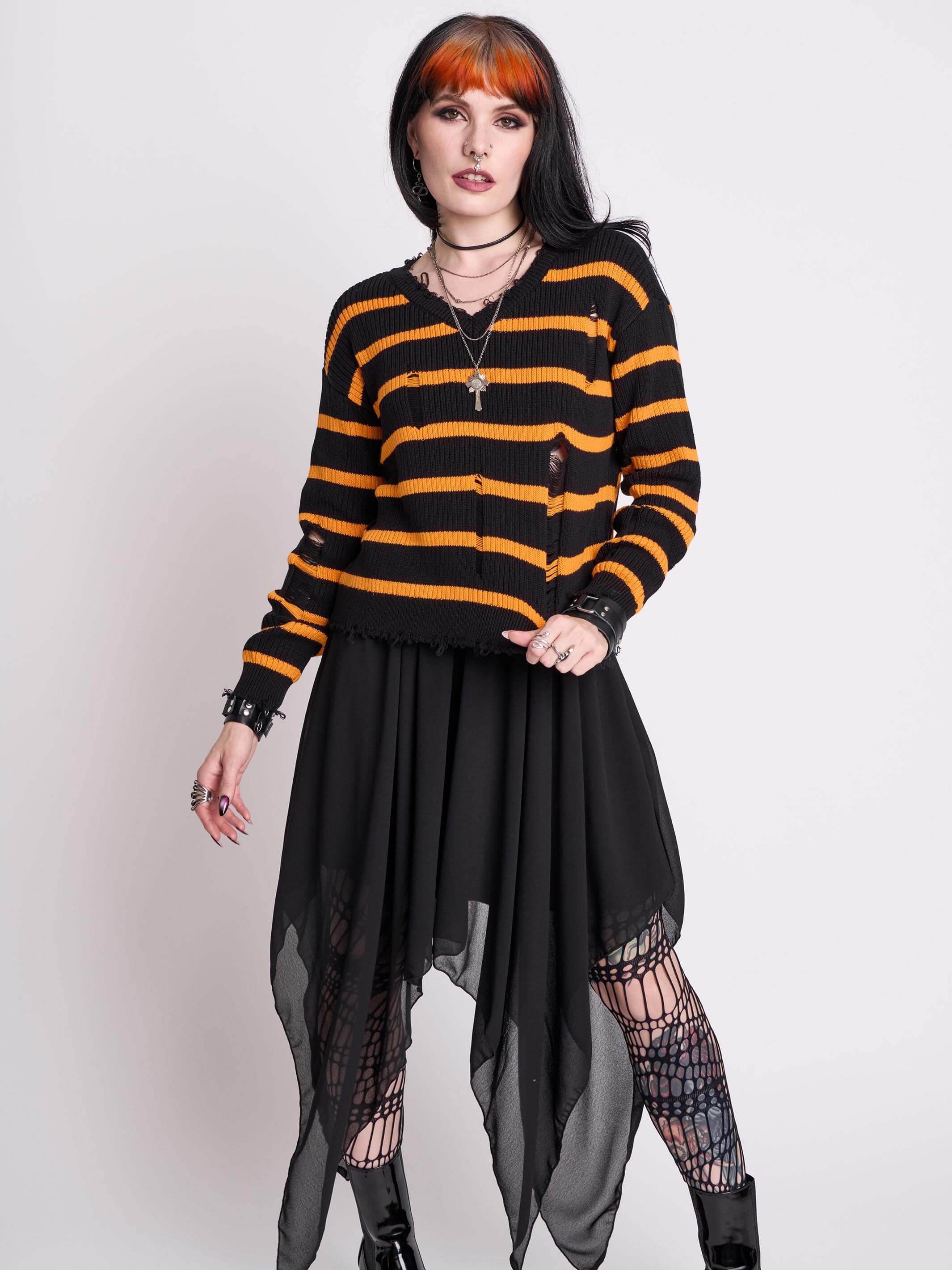 orange and black stripe distressed sweater