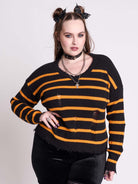 orange and black stripe distressed sweater